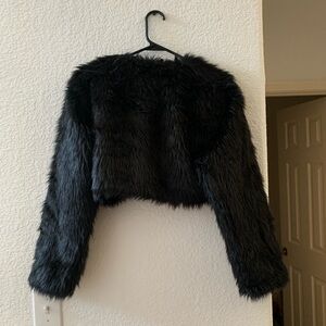 NITE OUT BY SAY WHAT BLACK FAUX FUR CROPPED COAT